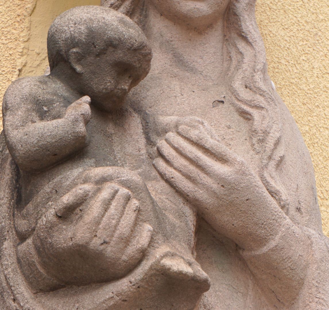 Mary with the baby Jesus Mary with baby Jesus in her arms, detailed view ​